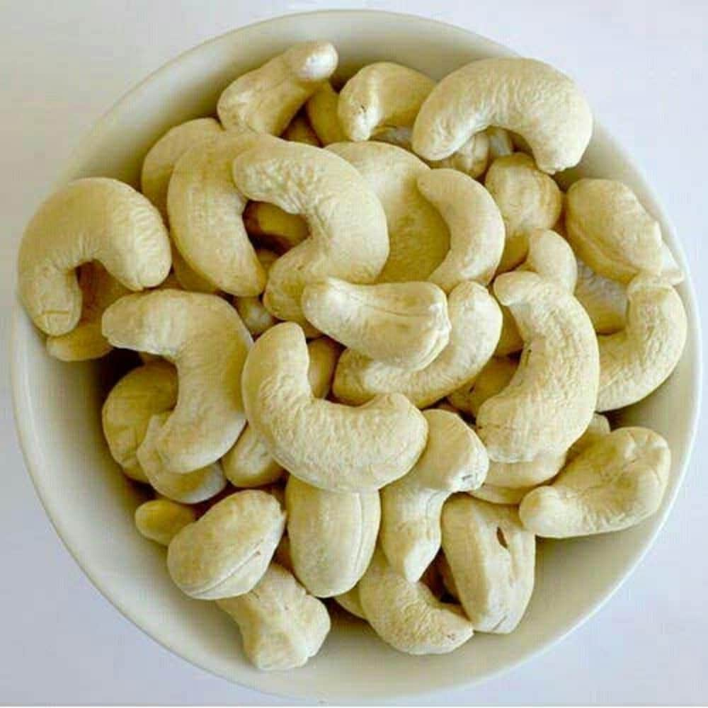 a bowl of cashew in a desk
